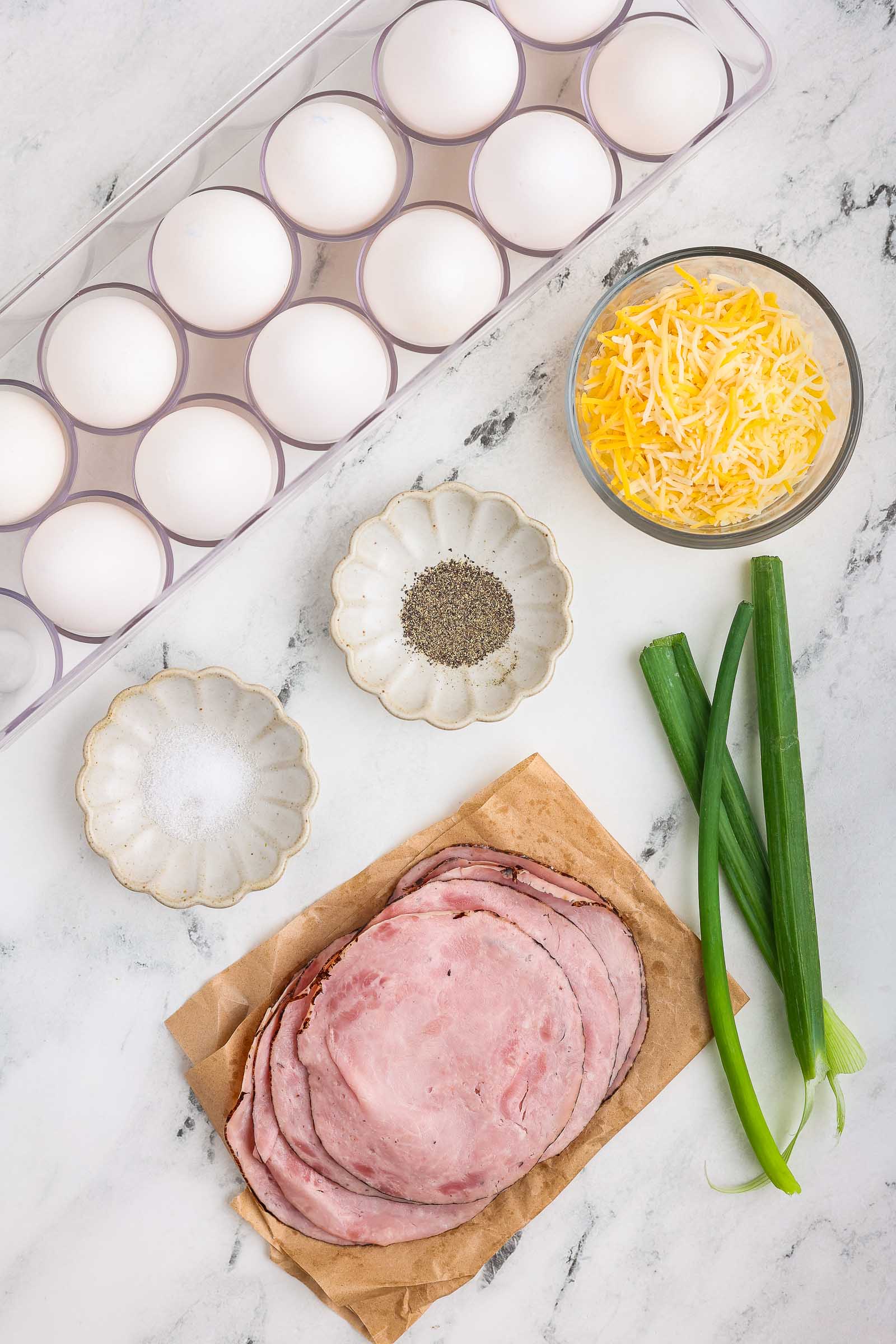 Hame and Cheese Eggs Cups ingredients on a table 